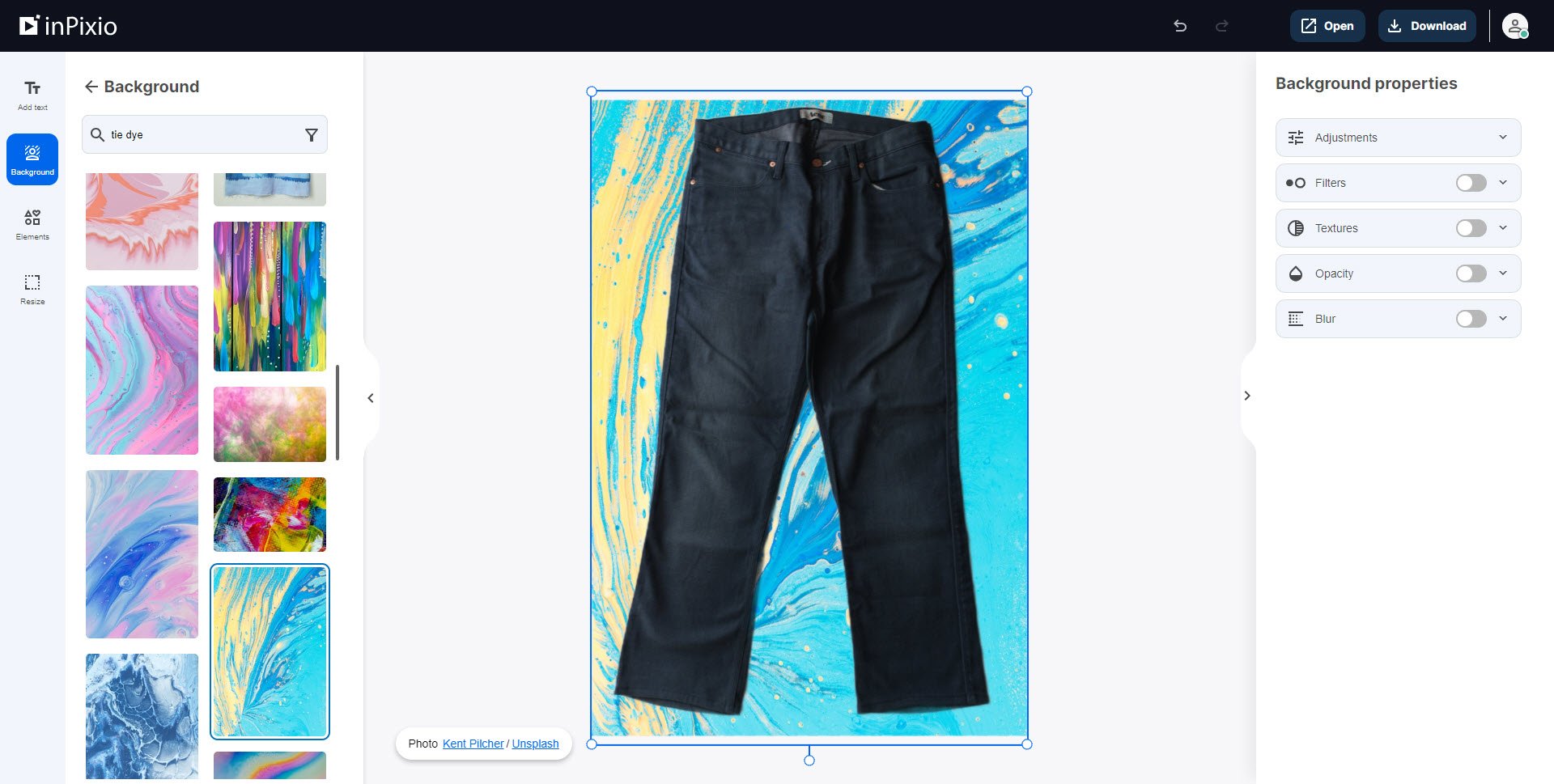 Pair of jeans with tie dye background